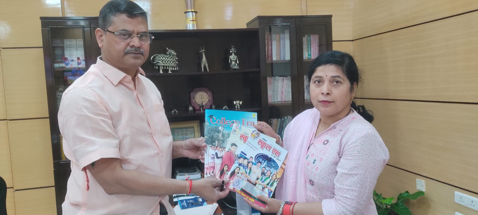 chief secretary of Jharkhand ,Mr. Avinash Kumar, receiving the 'COLLEGE ERA' magazine